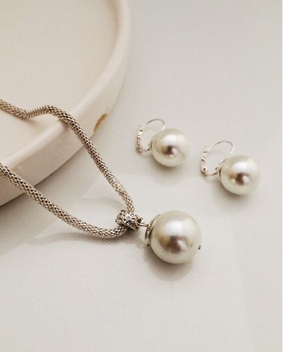 ست بدلیجات رولباسى مرواويدى زنانه Tosh