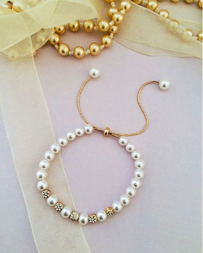 دست بند مرواريدى اسانسورى زنانه Tosh